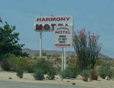 Harmony Motel sign proclaiming 'When if not here'