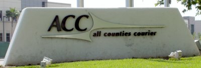 ACC (All Counties Courier) sign