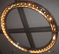 Circle of lights with cross-bars.