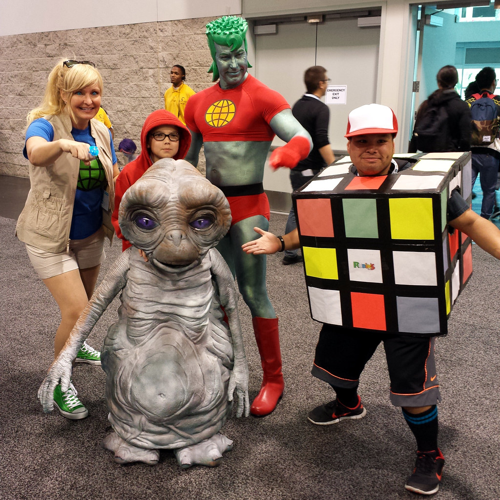 Cosplay group: ET, Rubik's Cube, and Captain Planet.
