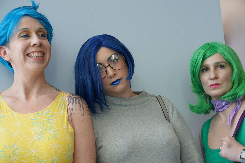 Women dressed as Joy, Sadness and Disgust from Inside Out