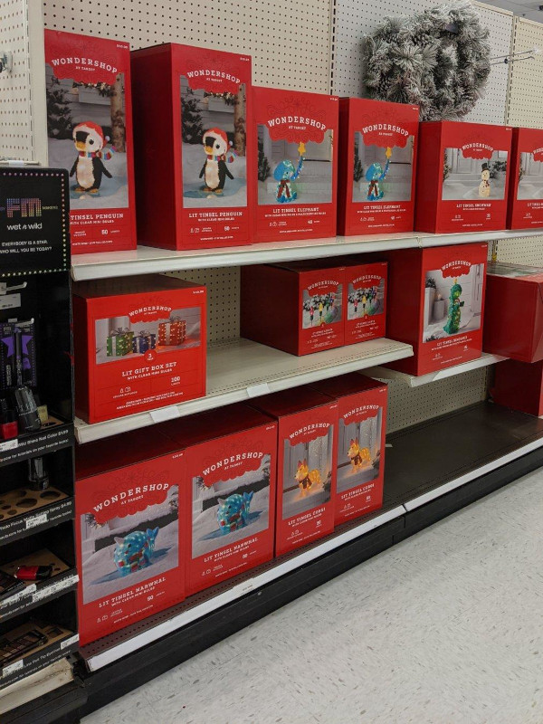 Christmas decorations on the shelf at Target, on Halloween day.