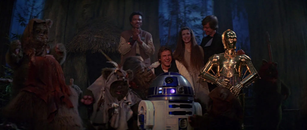 Rebels and Ewoks celebrating at the end of Return of the Jedi.